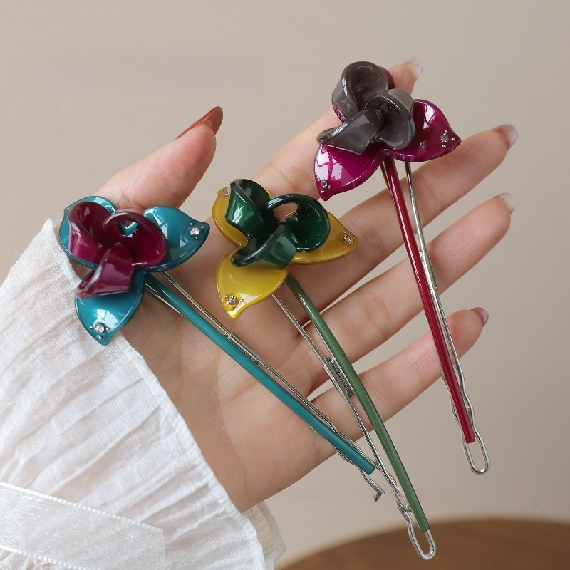 Travel Accessories Bunnings - Elegancka spinka do włosów w kształcie