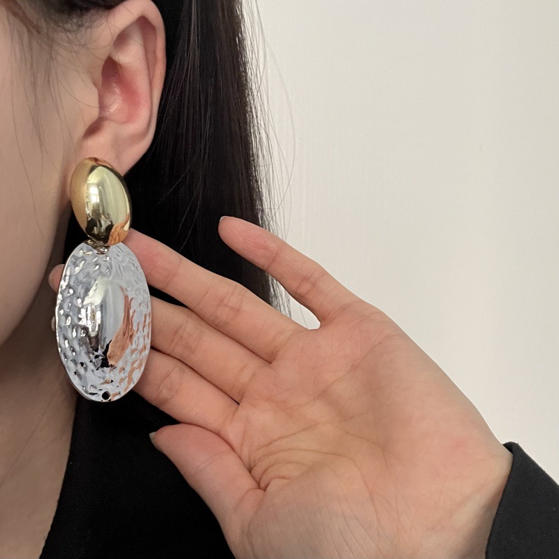 Metalowe owalne kolczyki dla k – Travel Accessories For Europe recenzja i cena